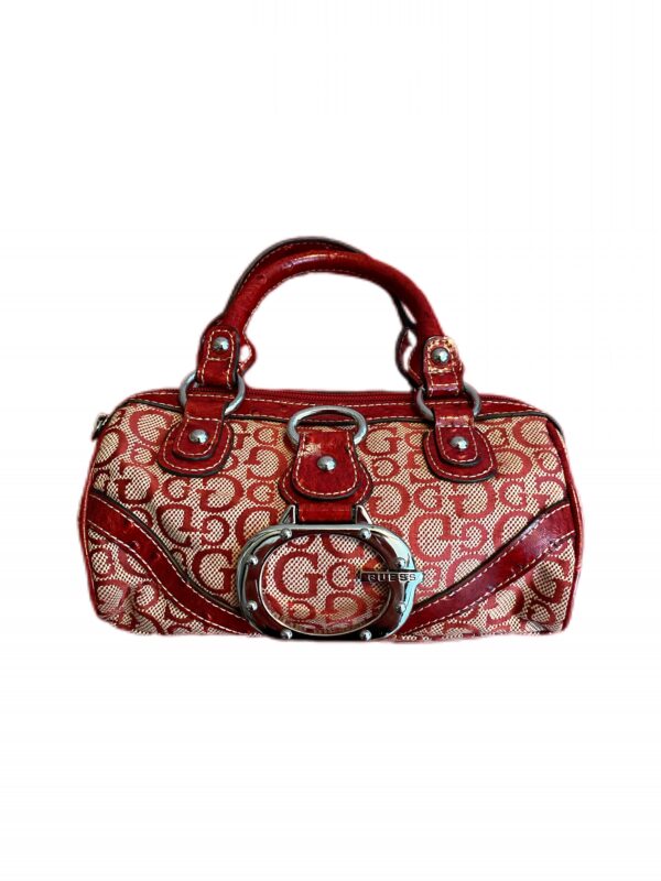 A charming mini hand bag from Guess in a striking red