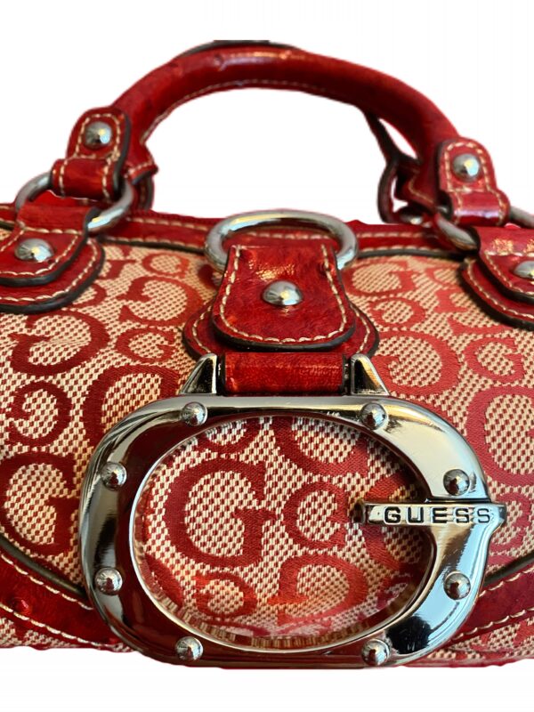 A charming mini hand bag from Guess in a striking red - Image 2