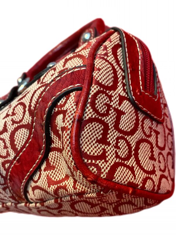 A charming mini hand bag from Guess in a striking red - Image 5