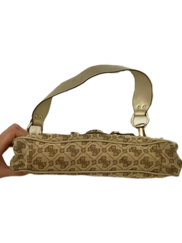 A Guess bag in beige with striking metal details along the sides - Image 6