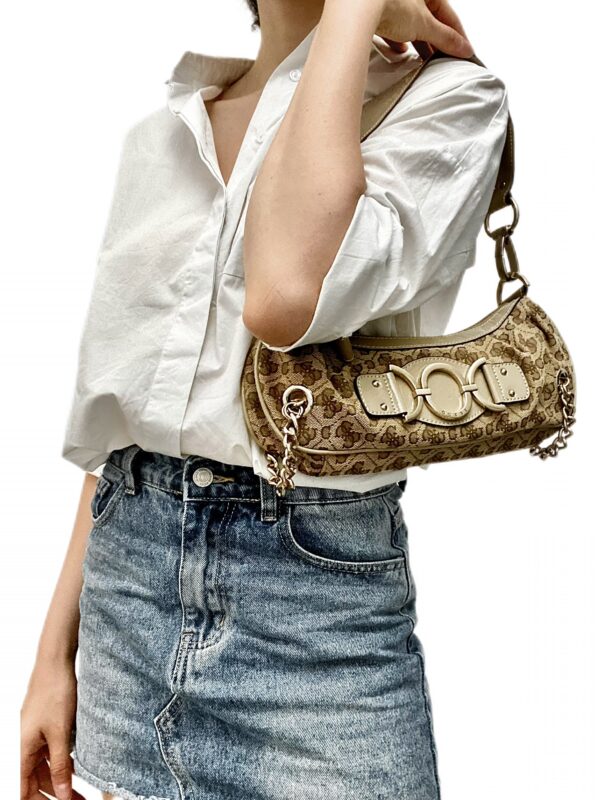 A Guess bag in beige with striking metal details along the sides - Image 2