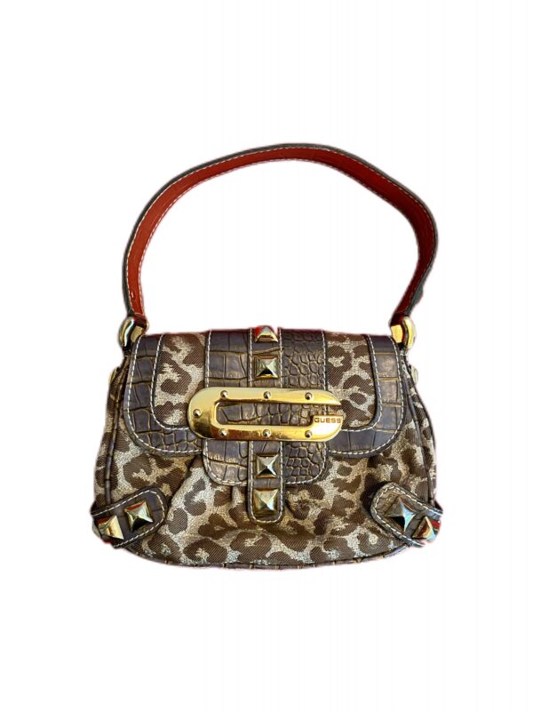 A bold leopard print Guess bag